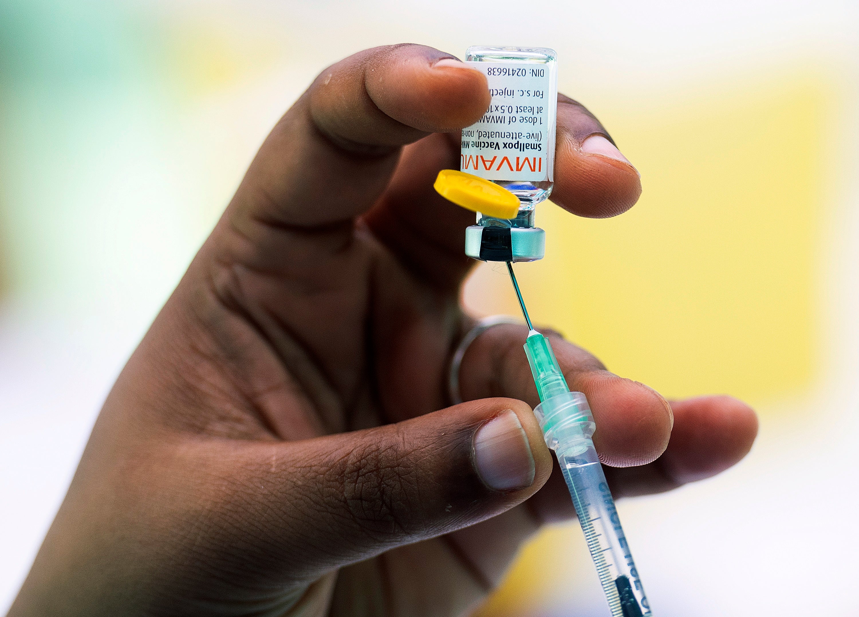 A health care worker prepares monkeypox vaccine in Montreal (Graham Hughes/AP)