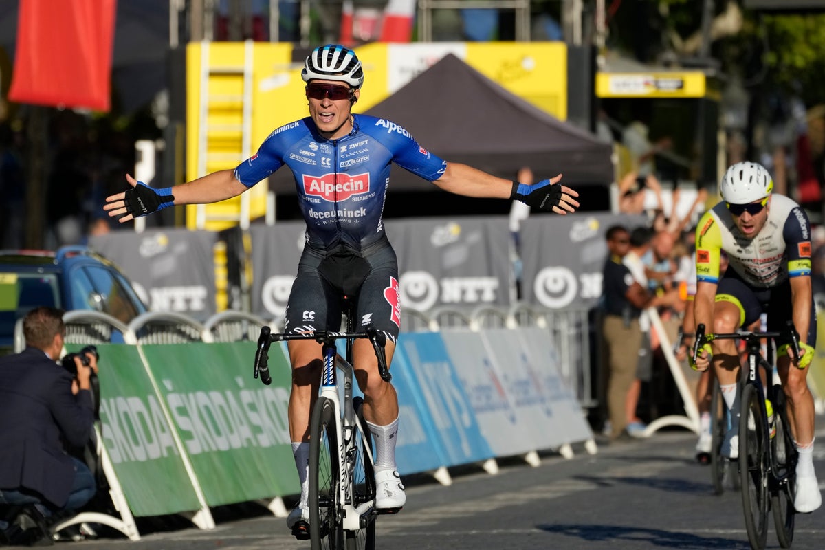 Jasper Philipsen wins final stage as Jonas Vingegaard takes Tour de France crown