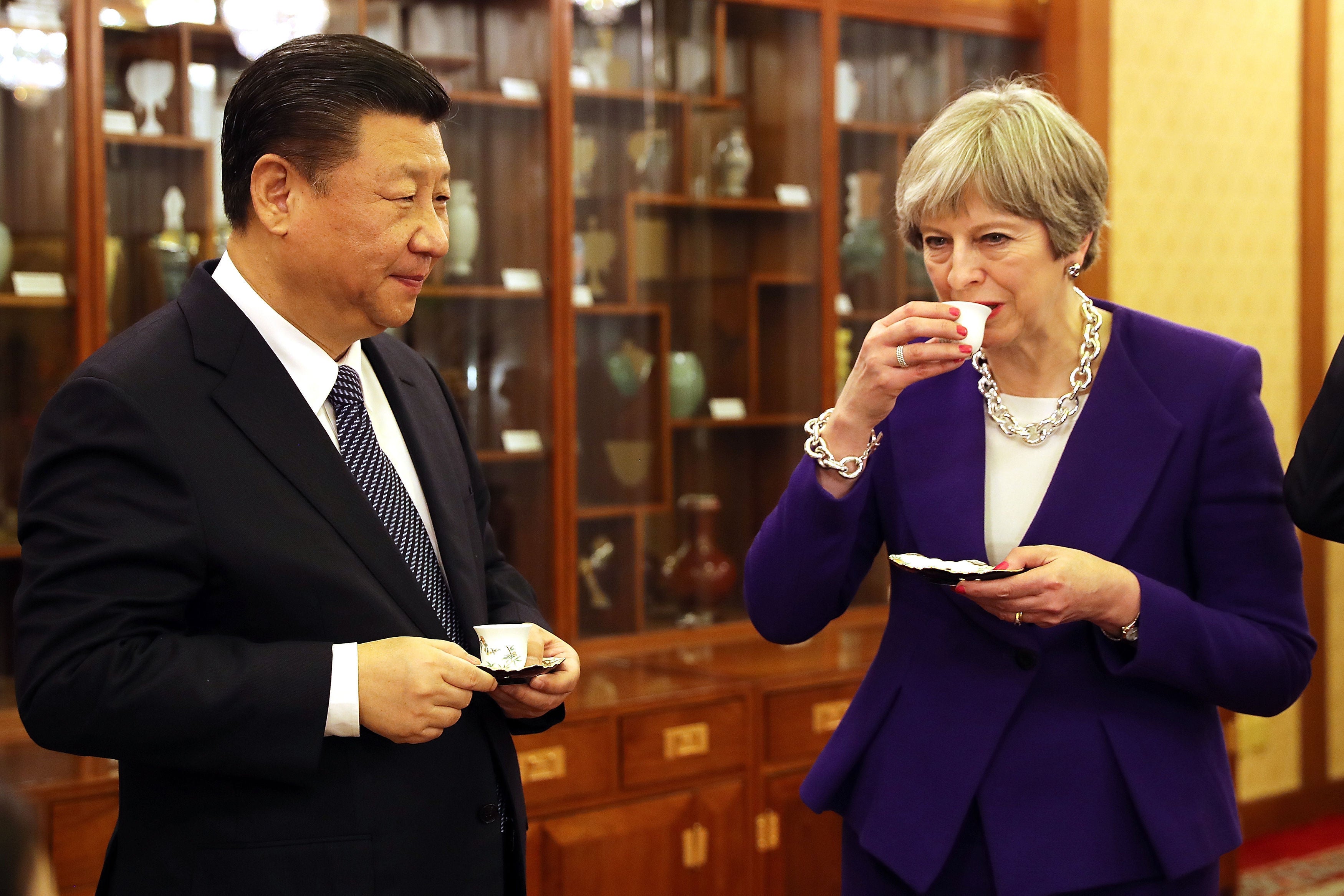 Former prime minister Theresa May with Chinese President Xi Jinping