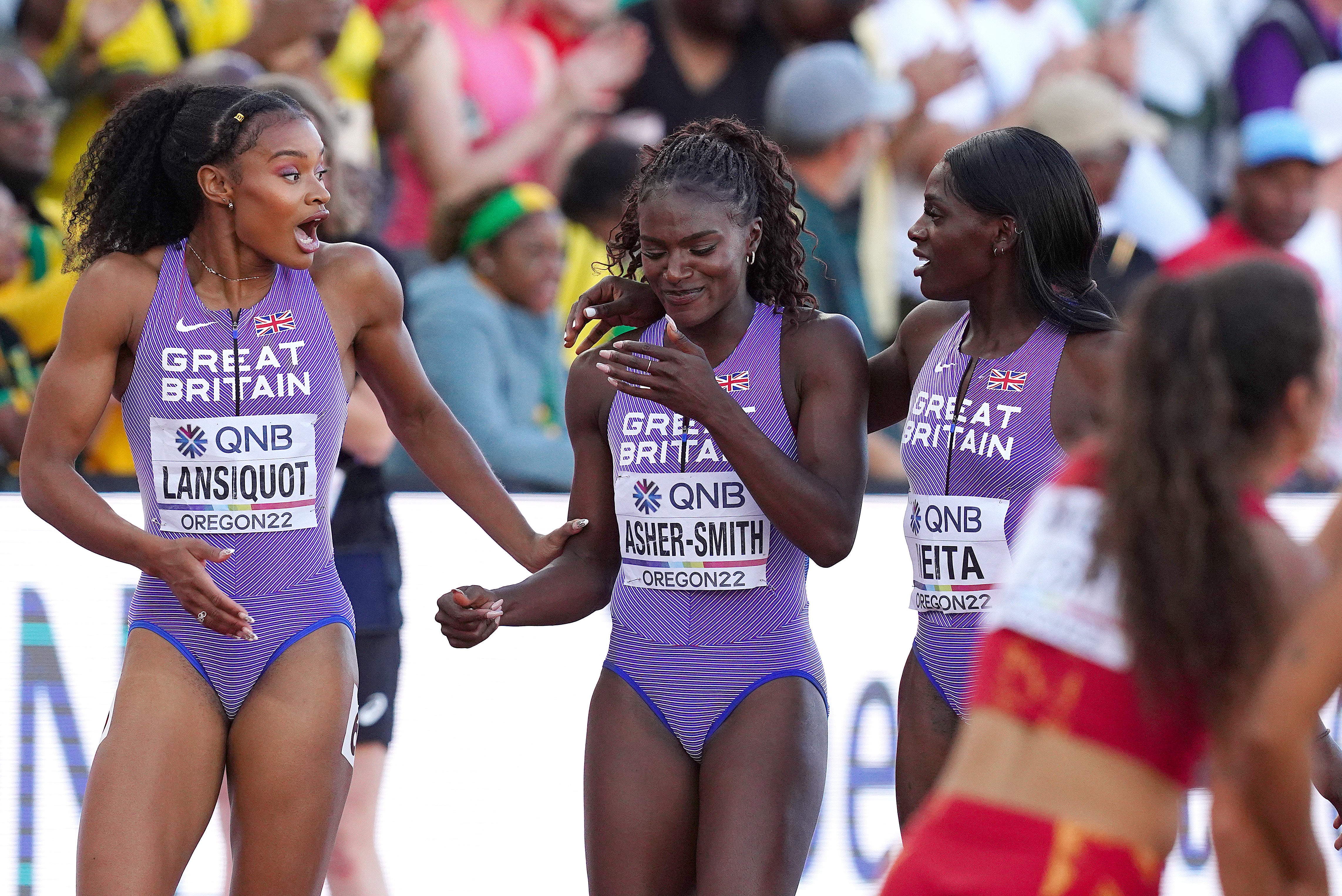Dina Asher-Smith (centre) faces a race to be fit for the Commonwealth Games after an injury in the relay at the World Athletics Championships in Oregon (Martin Rickett/PA)