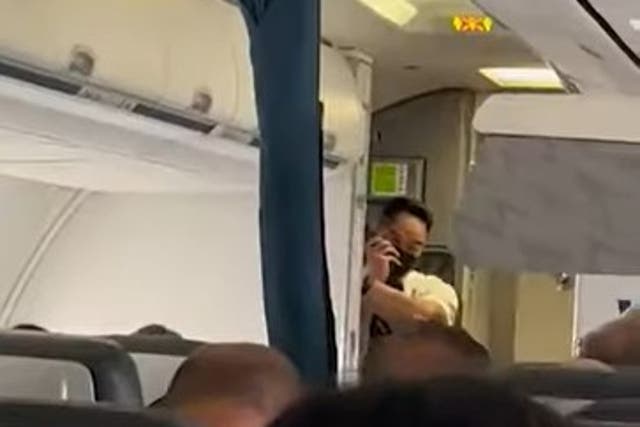 <p>The flight attendant singing over the speaker system</p>
