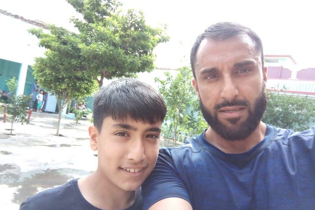 Sami Ahmed, who died in a fall in the Lake district on July 10, with his father Khalil (Family handout/PA)