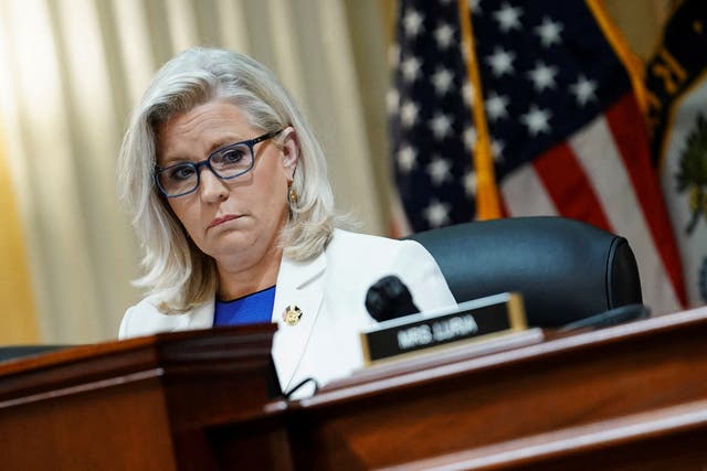 <p>Representative Liz Cheney looks on during a public hearing </p>