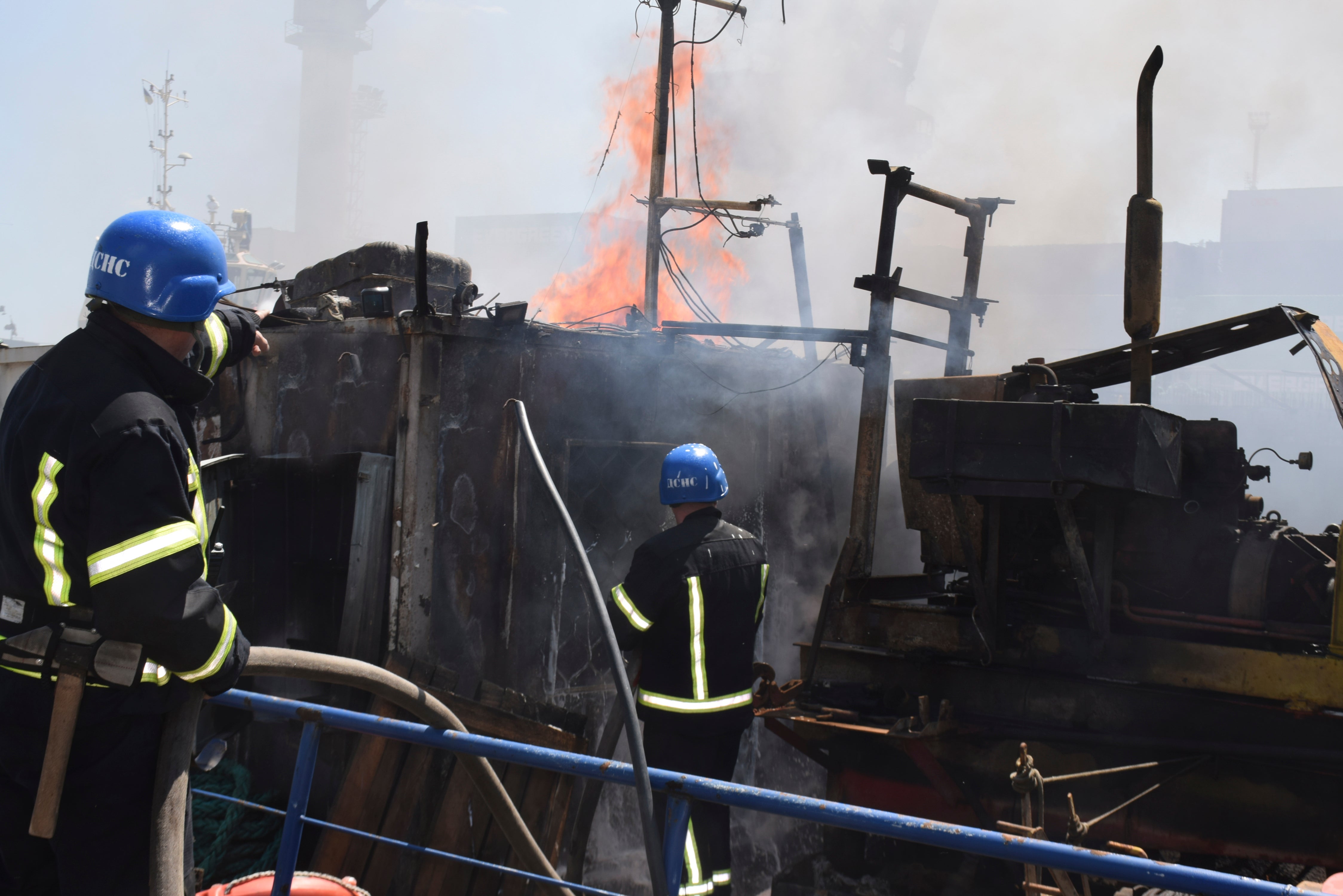 Odesa firefighters battle a port blaze after a Russian missile attack on Saturday