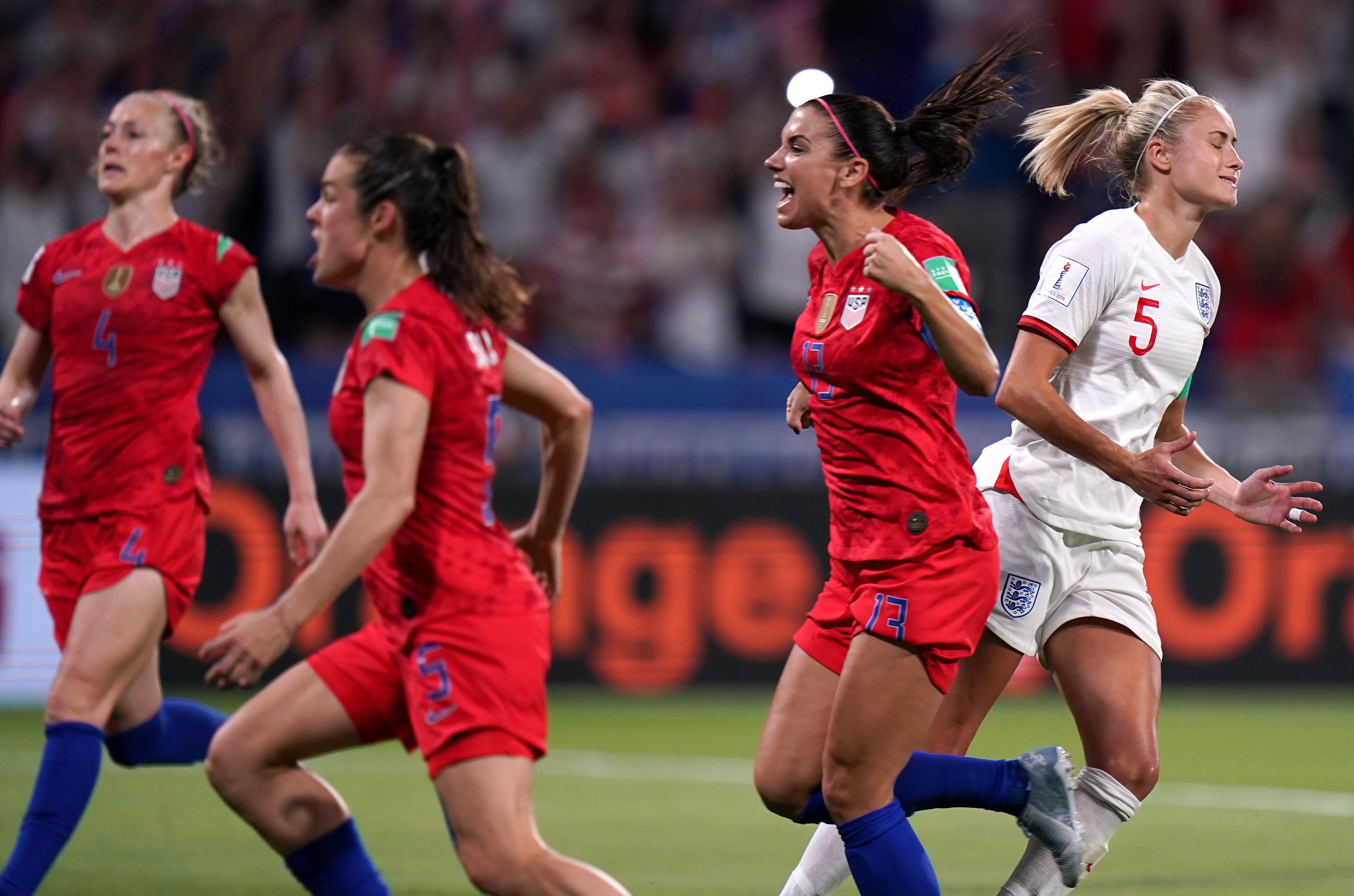 United States players celebrate as Steph Houghton, right, reacts to her penalty being saved in the 2019 World Cup semi-final (John Walton/PA)