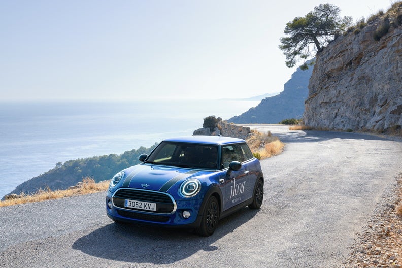 Ikos Resorts will lend you a Mini or a Tesla for a day’s exploring