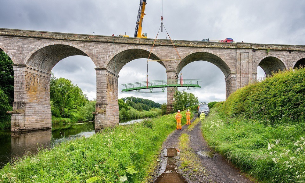 Handout image of Teviot’s first span being installed following renovation work. (National Highways/PA)