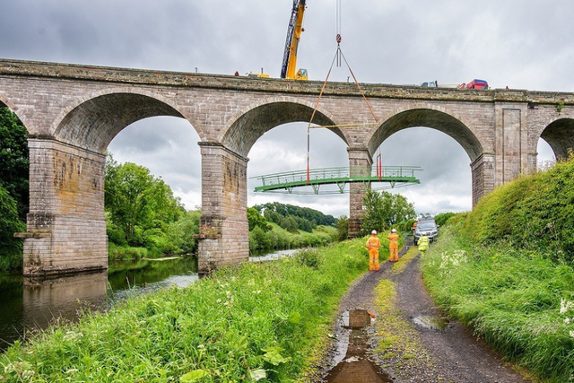 Handout image of Teviot’s first span being installed following renovation work. (National Highways/PA)