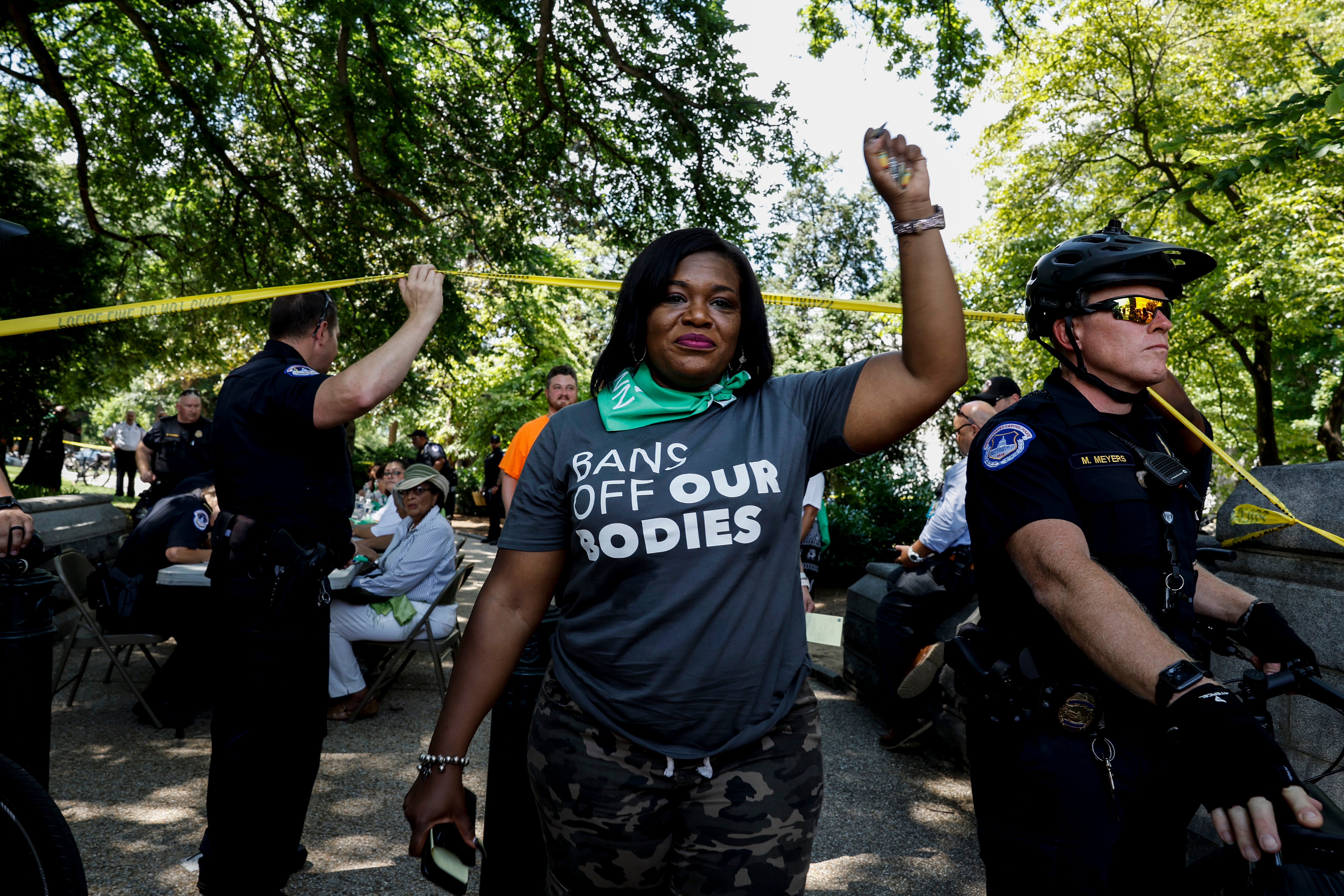 Congresswoman Cori Bush leaves processing area after being arrested for participating in a sit-in over abortion rights