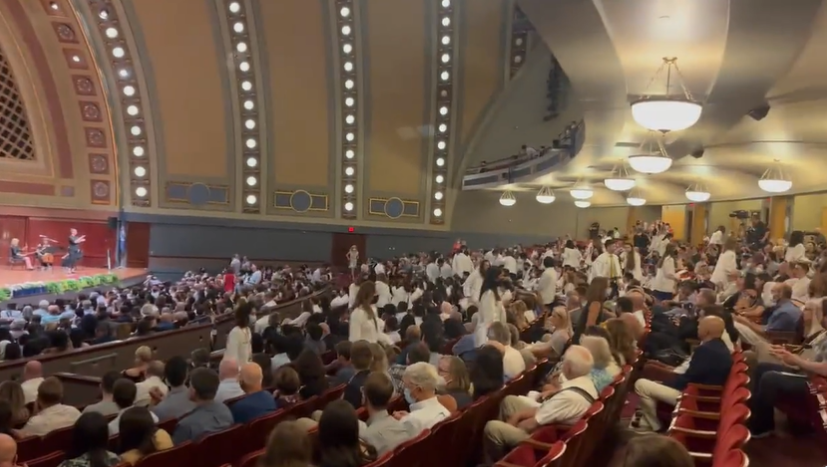 <p>Medical school students staged a walkout during the University of Michigan’s White Coat Ceremony on Sunday, 25 July 2022</p>