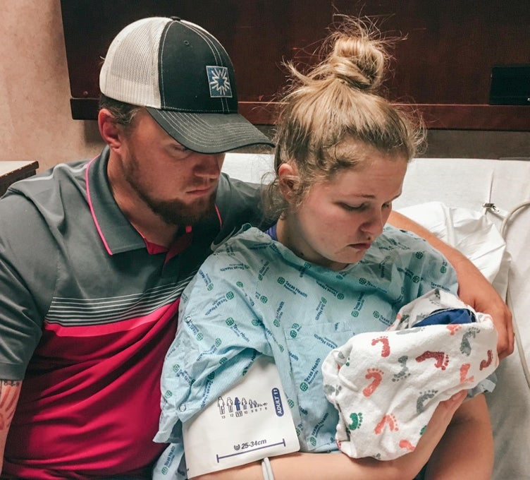 Kailee DeSpain with her husband and their daughter Chelsea who was born at 16 weeks and didn’t survive