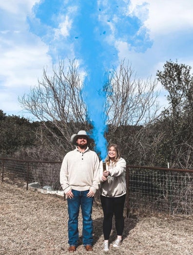 Kailee DeSpain and her husband at their gender reveal for baby Finley