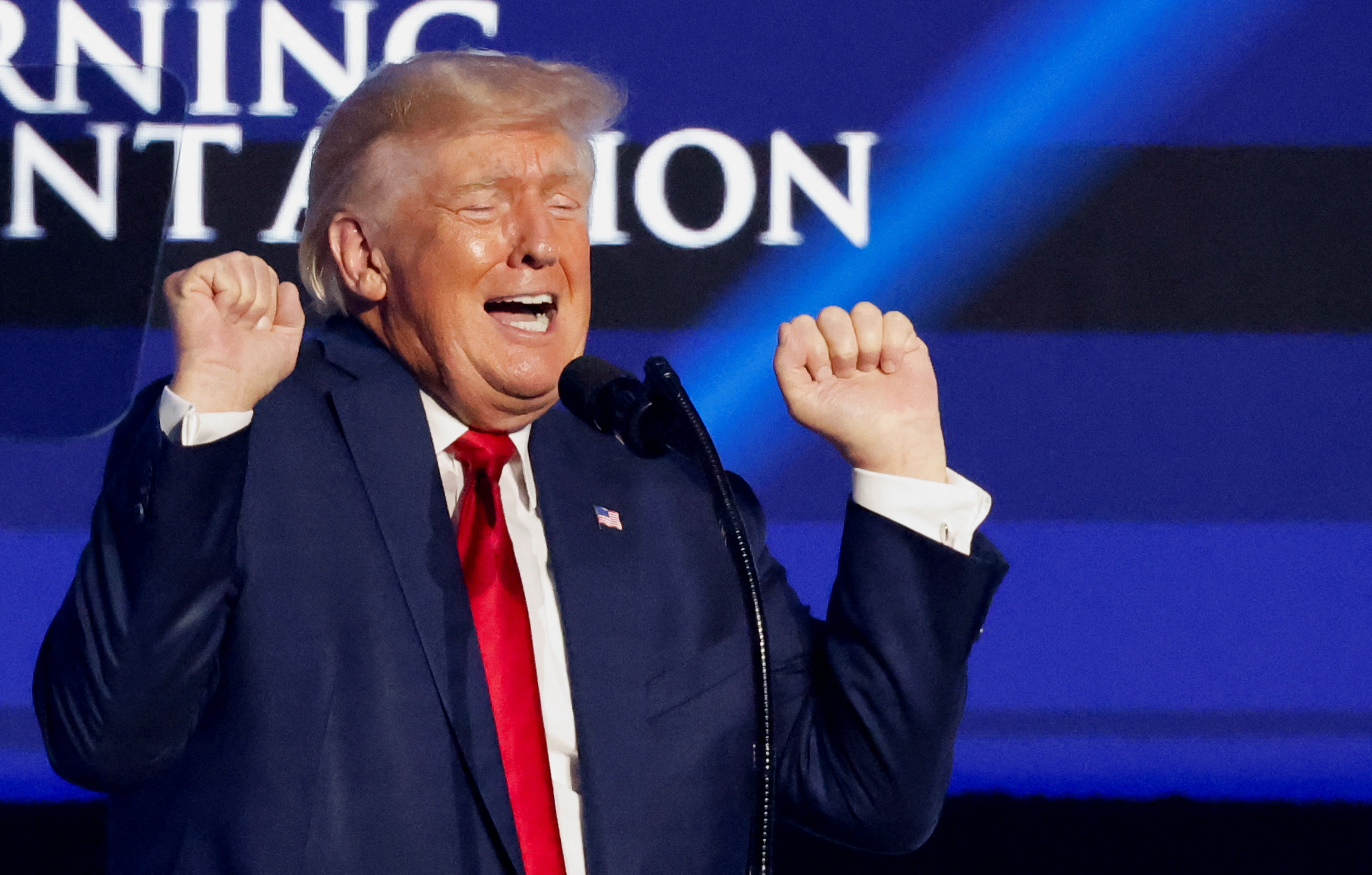 <p>Former U.S. President Donald Trump gestures as he speaks at the Turning Point USA's (TPUSA) Student Action Summit (SAS) in Tampa, Florida</p>
