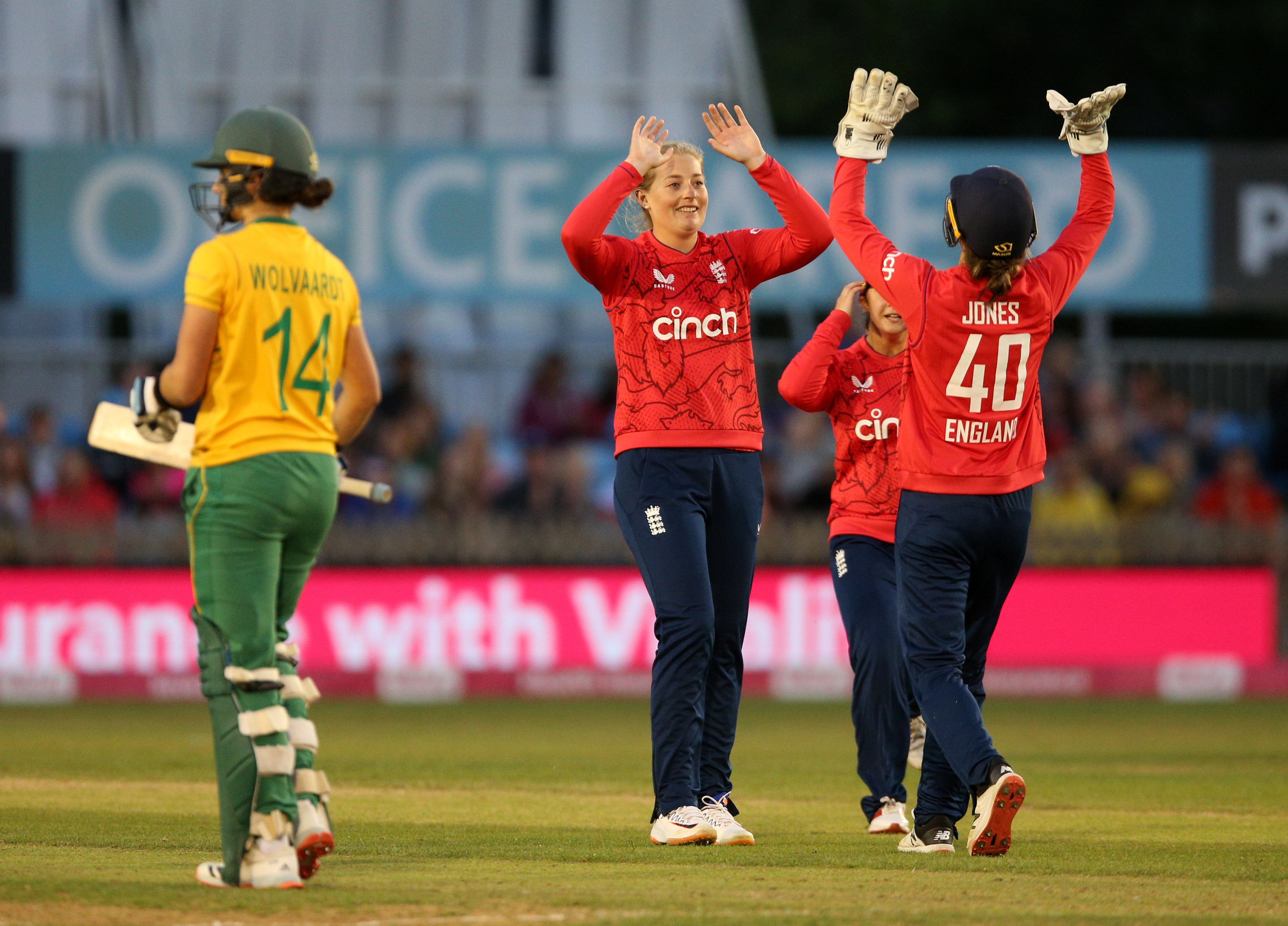 England’s Sophie Ecclestone, centre, celebrates after taking the wicket of South Africa’s Laura Wolvaardt (Nigel French/PA)