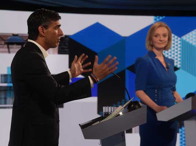BBC handout photo of Rishi Sunak and Liz Truss speaking during the BBC1 Conservative leadership debate, Our Next Prime Minister, hosted by Sophie Raworth, at Victoria Hall, Hanley, Stoke on Trent. Picture date: Monday July 25, 2022.