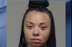 Woman shot after opening fire at Dallas airport is former bank robbery suspect, police say