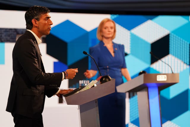 <p>Rishi Sunak and Liz Truss take part in the BBC Leadership debate at Victoria Hall on 25 July 2022 in Hanley, England</p>