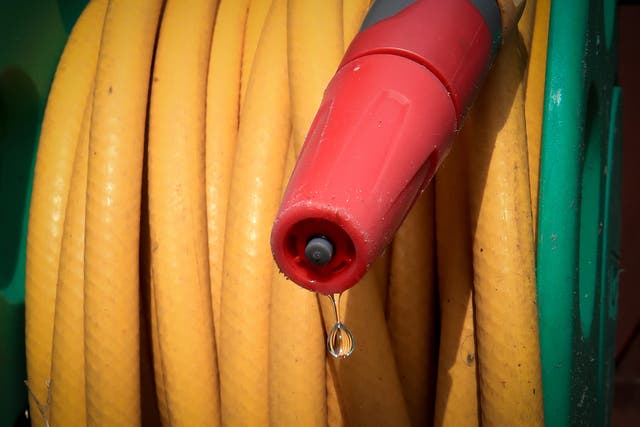 Hosepipe attached to a water tap. The North West Region of England is to be hit with a hosepipe ban next month due to the recent heatwave the highest on record for the time of year.