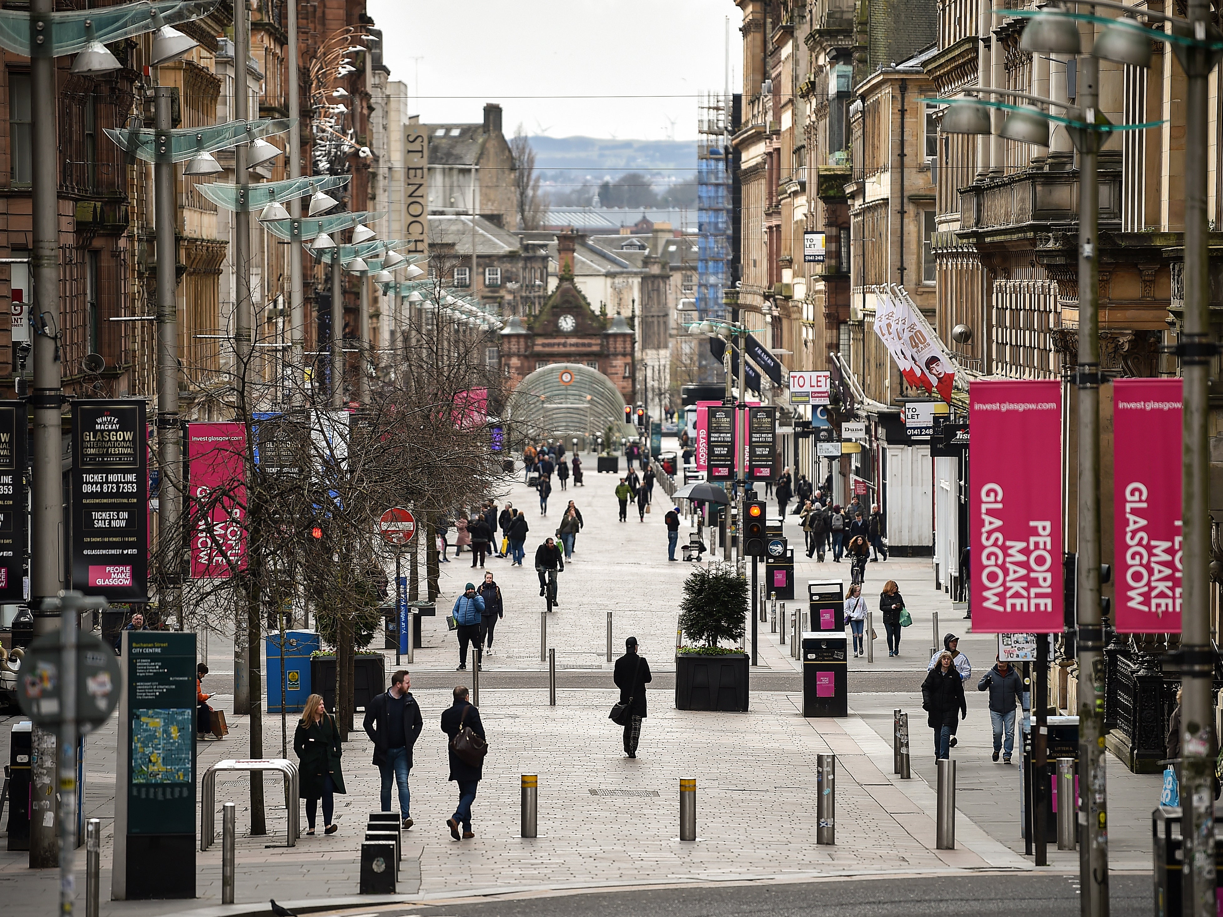 <p>Members of the public walking on Buchanan Street on 21 March, 2020 in Glasgow, Scotland</p>