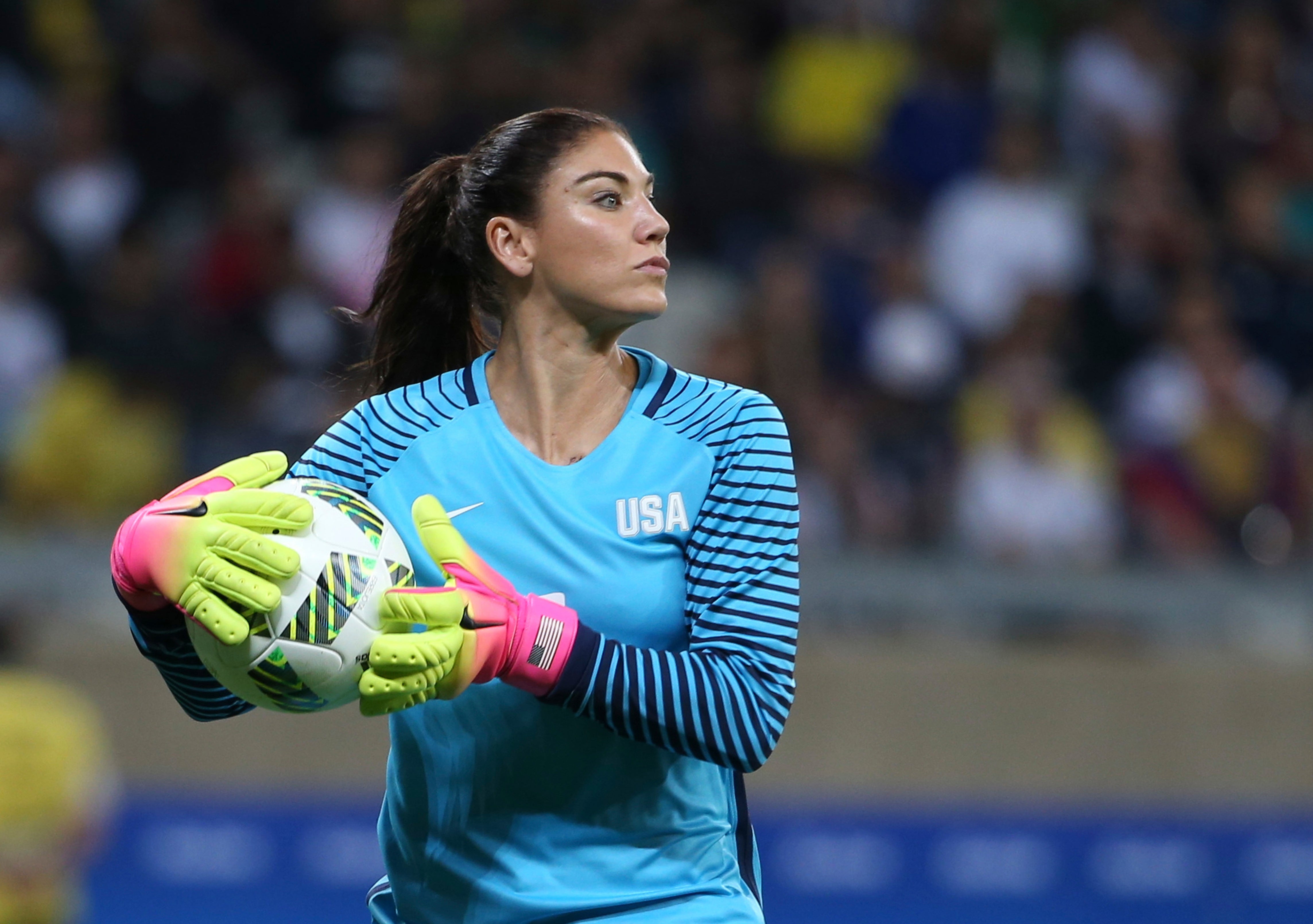 United States goalkeeper Hope Solo takes the ball during a women's soccer game at the Rio Olympics against New Zealand on Aug. 3, 2016