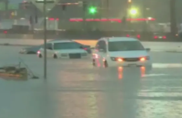 <p>Several cars are underwater on Interstate 70 in St Peters, Missouri, on Tuesday morning</p>