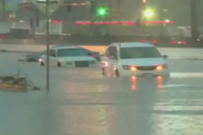 One dead after record-breaking rainfall in St Louis traps motorists and forces residents to shelter in place