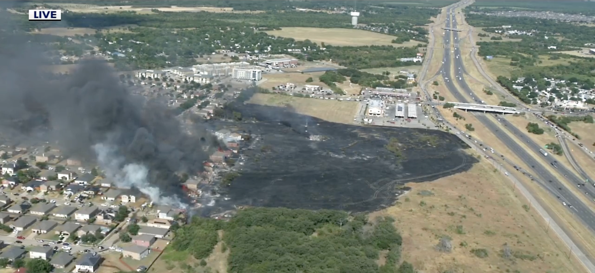 Nine homes destroyed in Dallas grass fire as punishing heat hits Texas