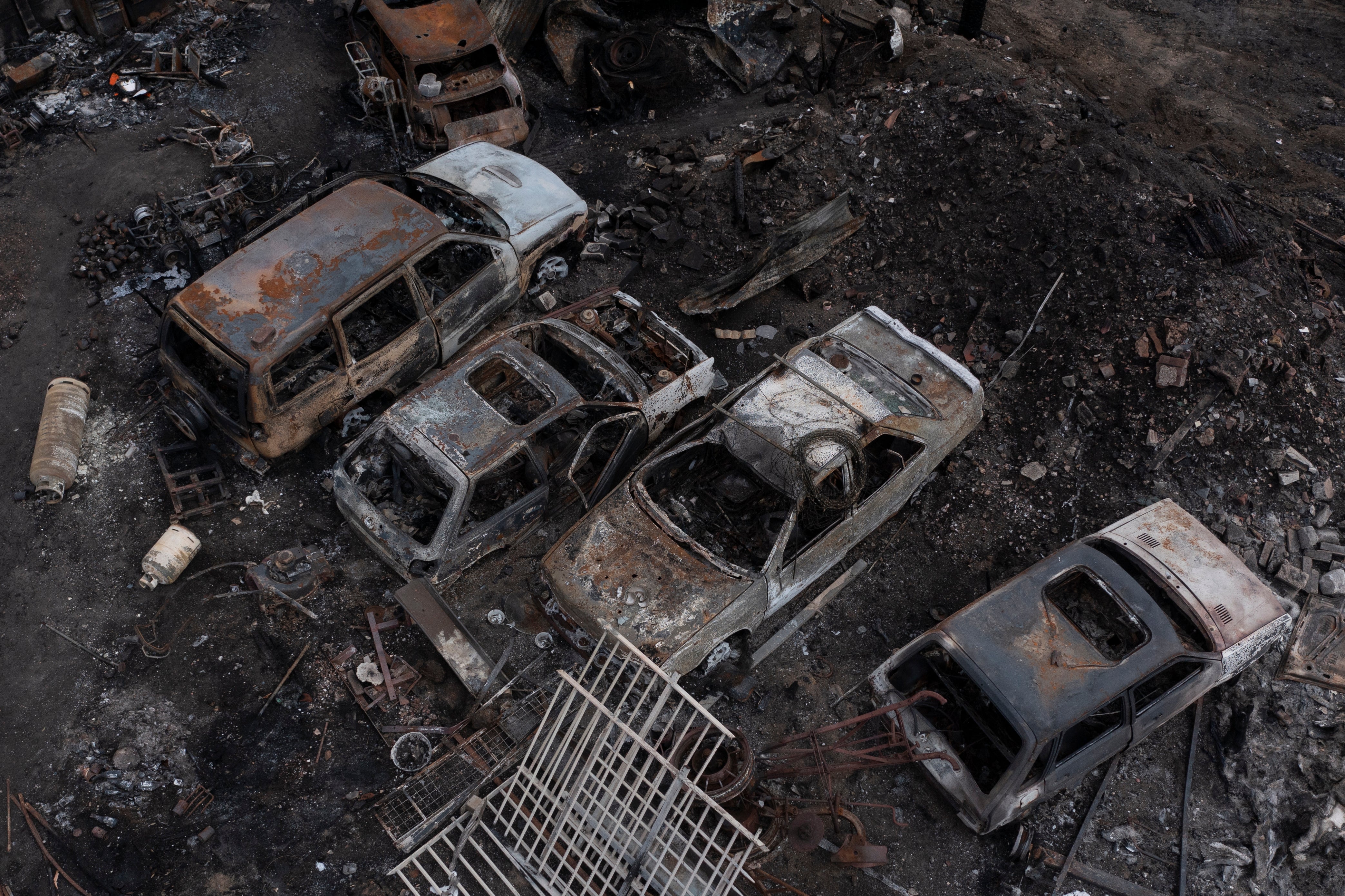 Cars destroyed by fire in Wennington, Greater London.