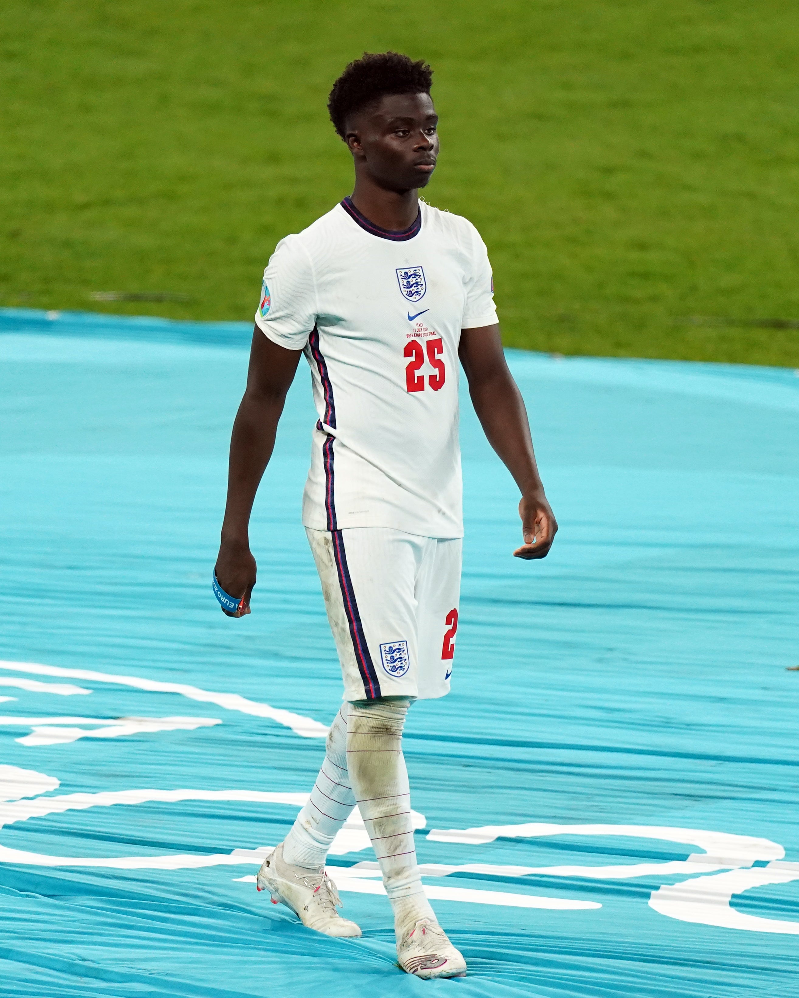 Bukayo Saka, pictured, cuts a dejected figure after missing a penalty in the Euro 2020 final (Mike Egerton/PA)