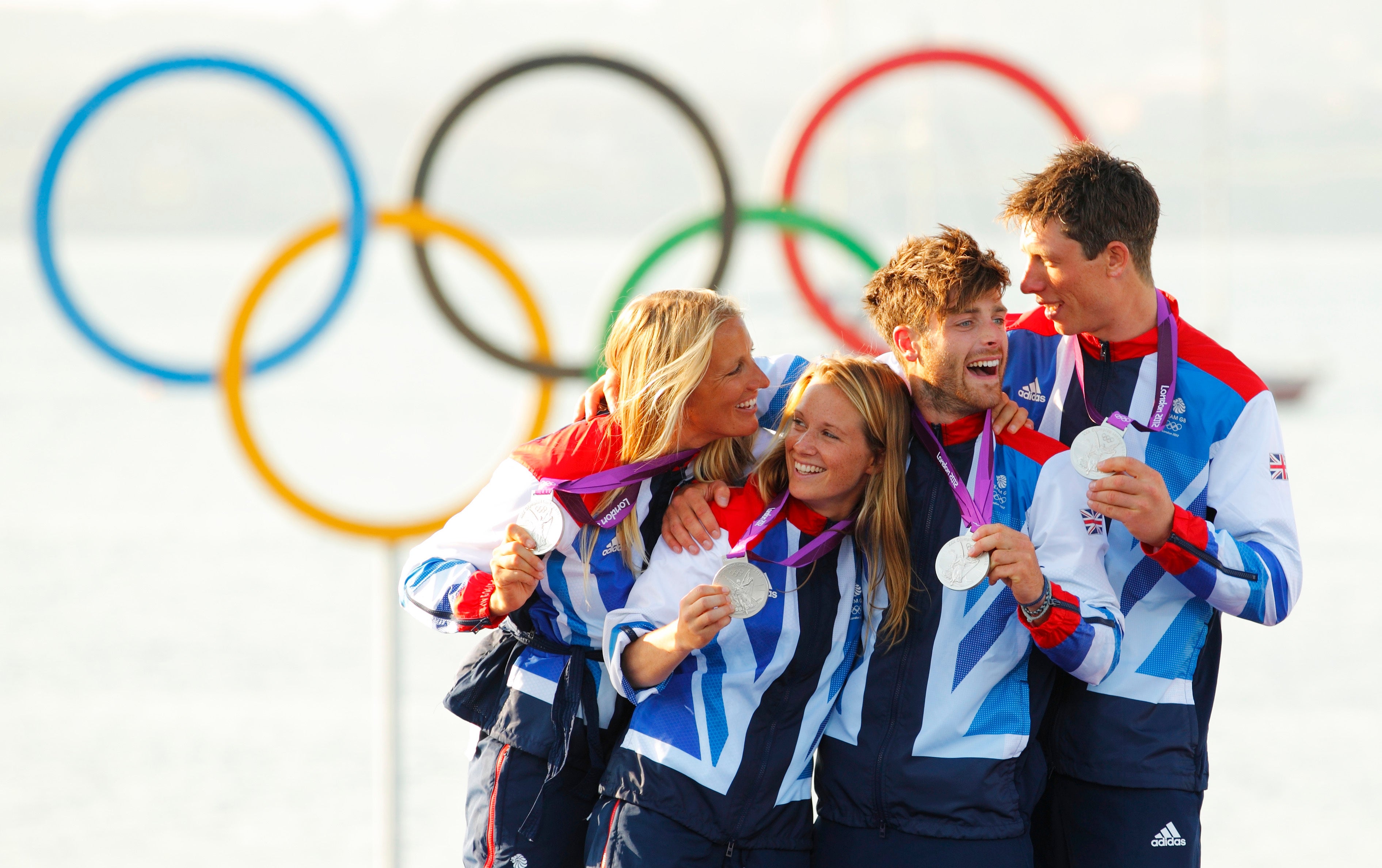 Hannah Mills and Saskia Clark (far left) won women’s 470 class sailing silver as did Luke Patience and Stuart Bithell (far right) in the men’s event (Chris Ison/PA)
