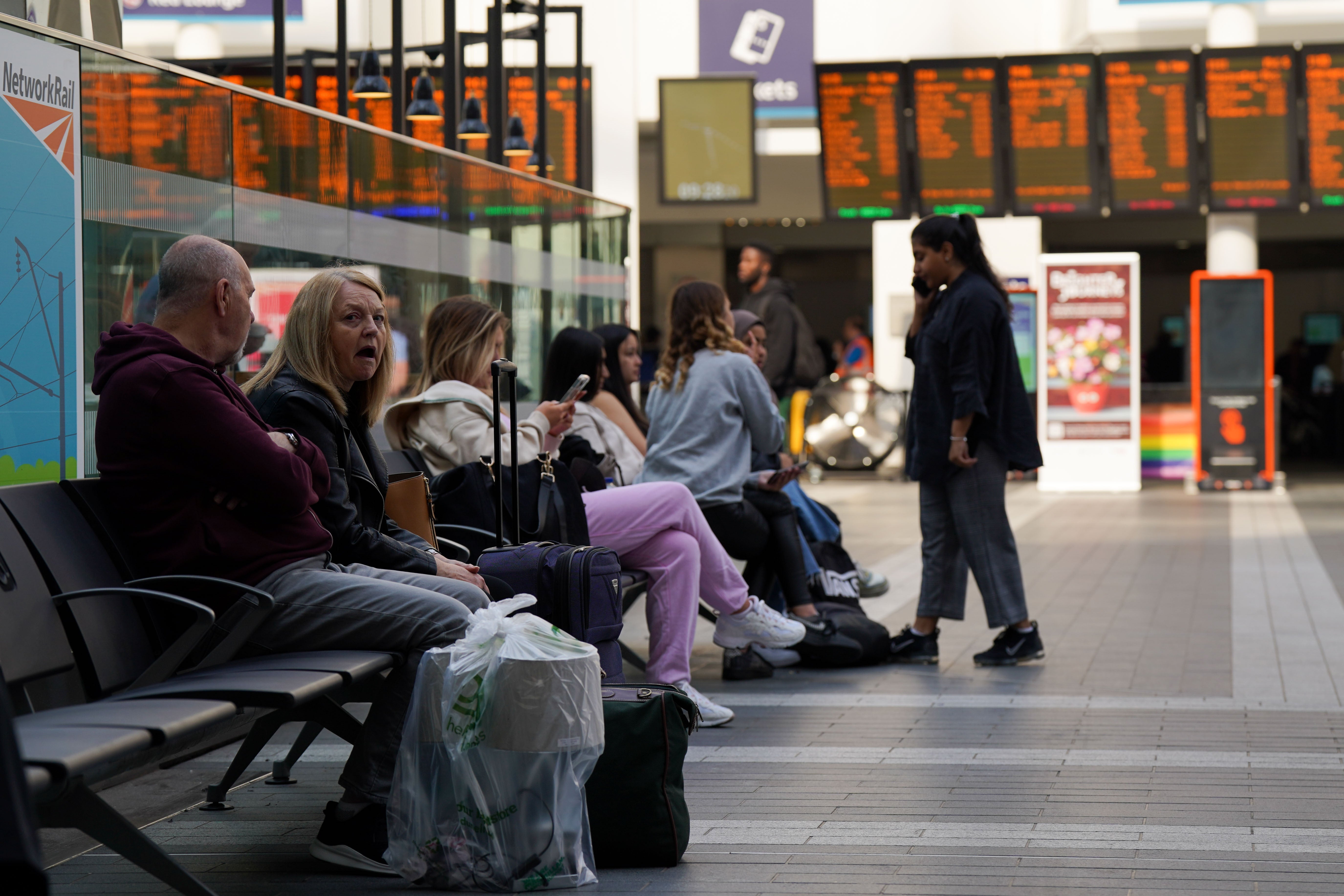 Passengers at Birmingham New Street station (Jacob King/PA)