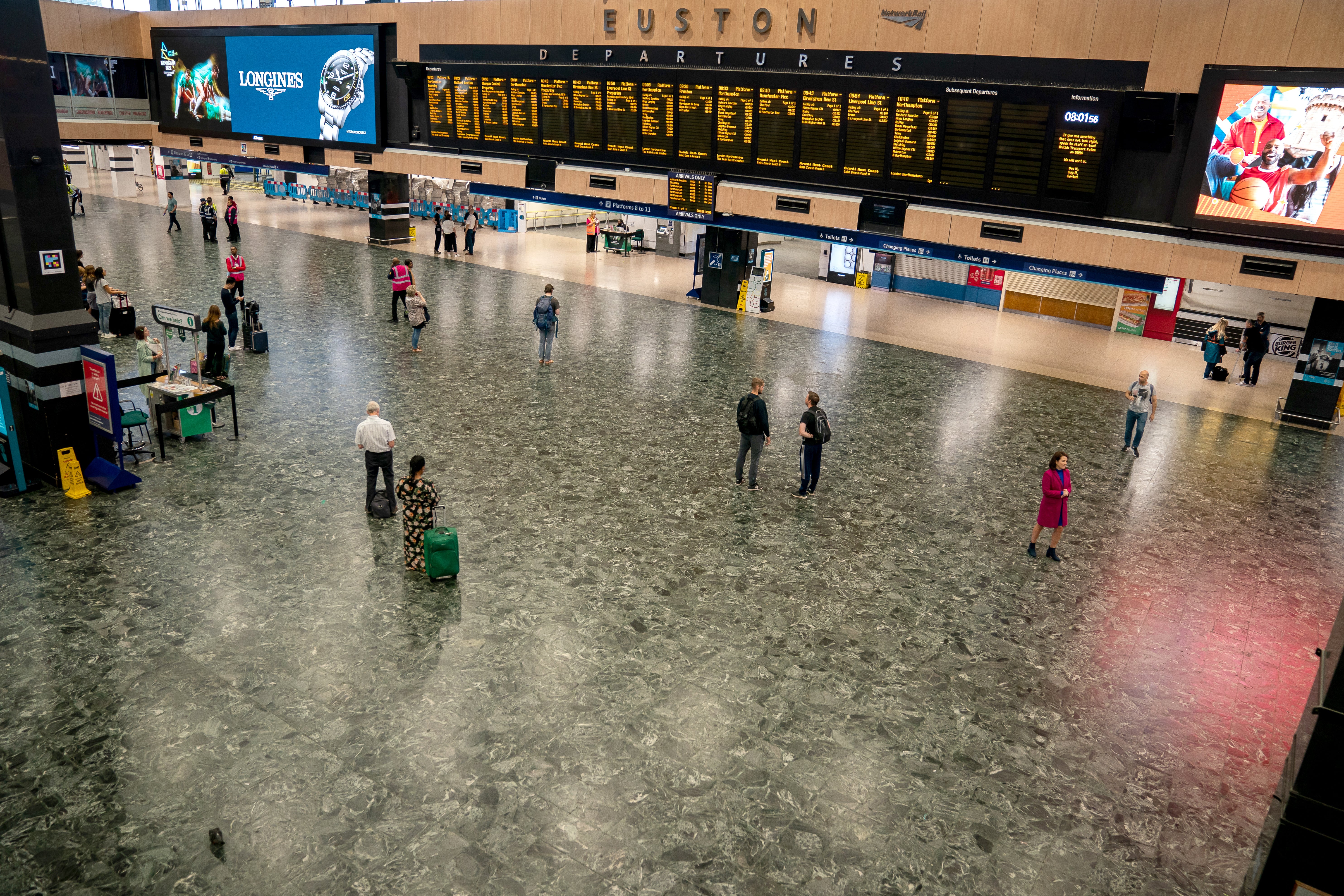 The near-empty station concourse during rush hour at London Euston station (Aaron Chown/PA)