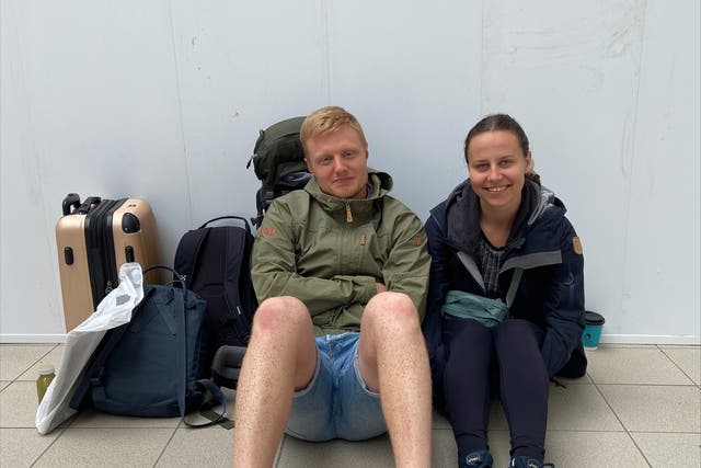Felix Nystrom and Rebecka Ronnegard waiting at Sheffield railway station (Gina Kalsi/PA)