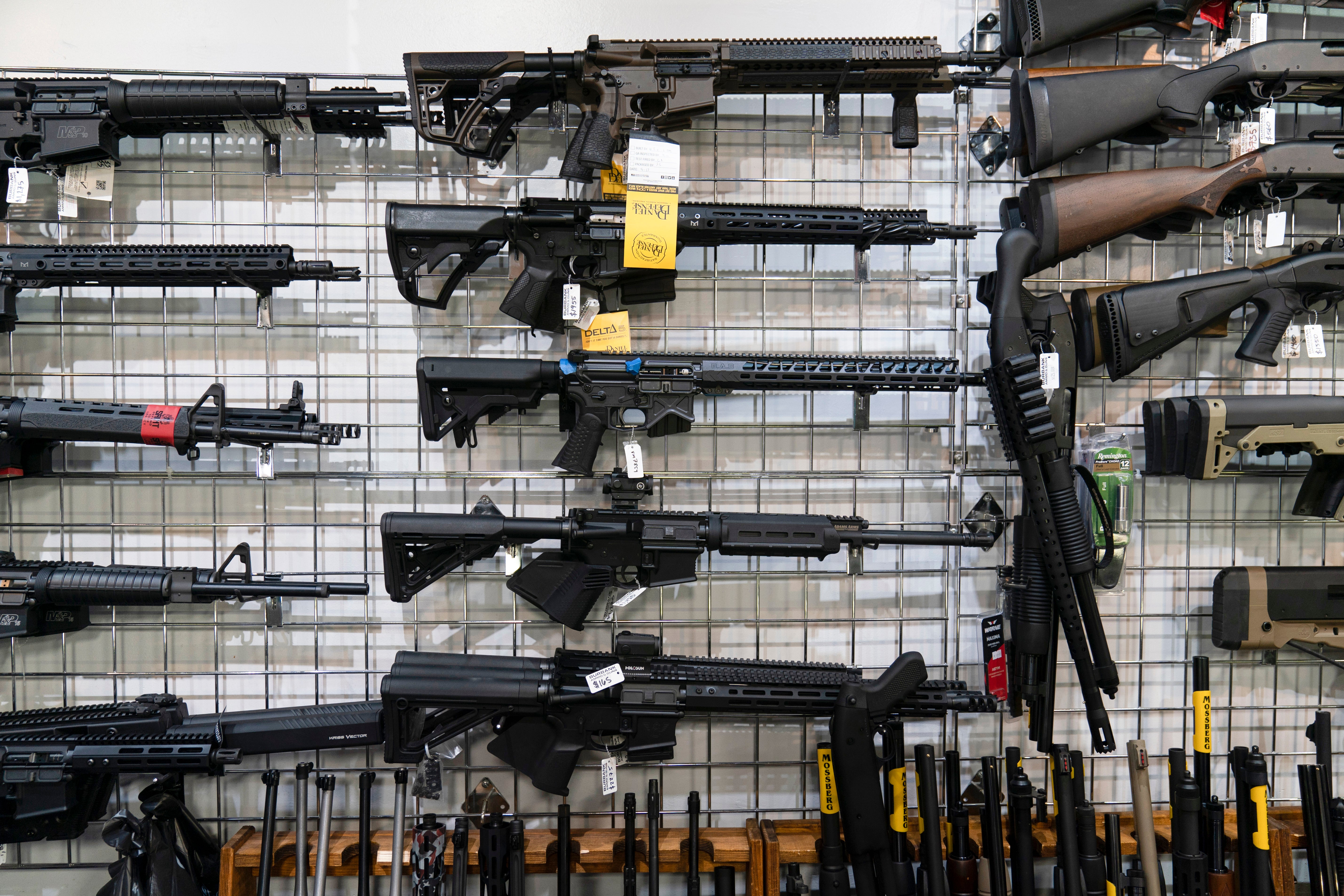 AR-15-style rifles are on display at Burbank Ammo & Guns in Burbank, California