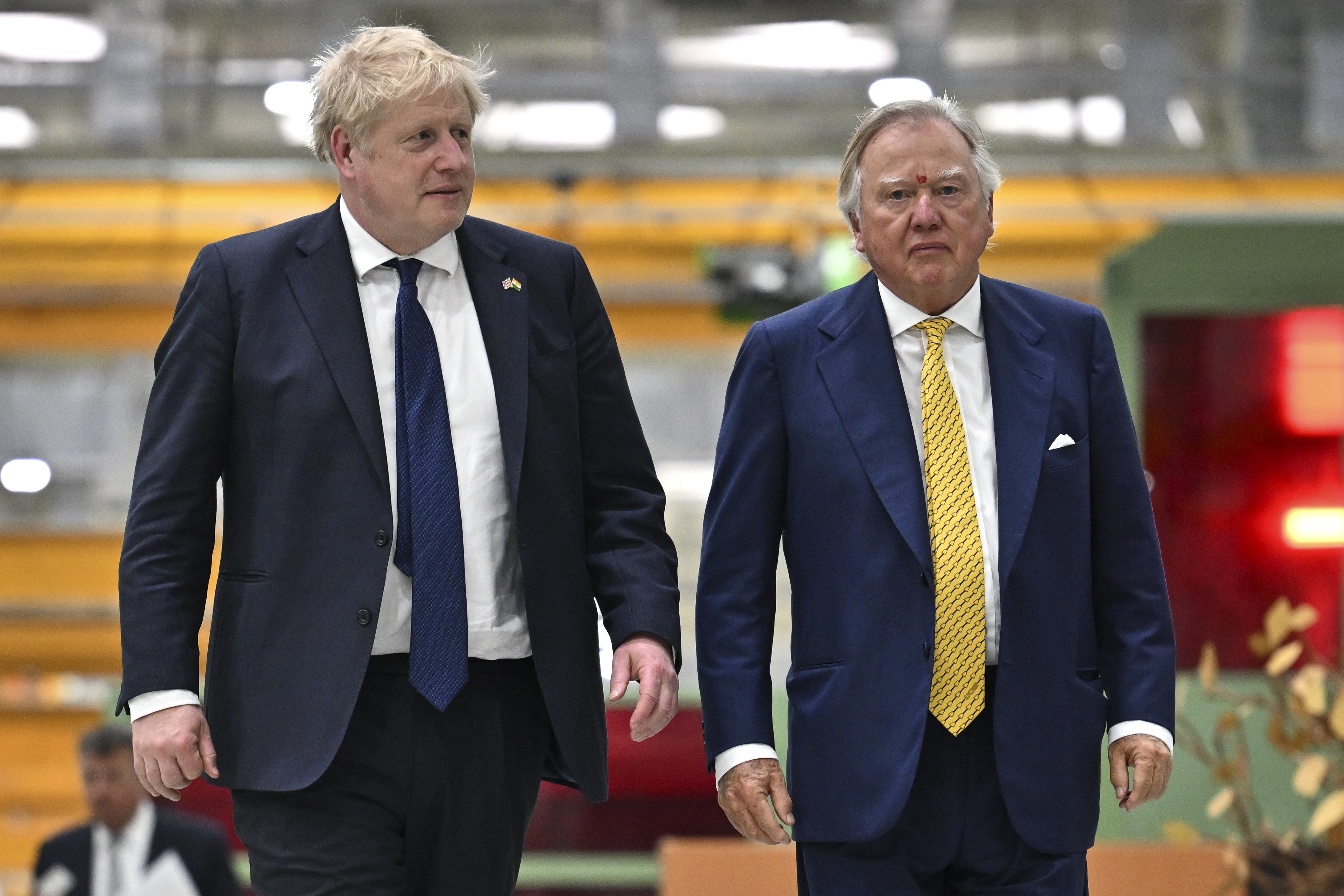 Boris Johnson with Lord Bamford (Ben Stansall/PA)