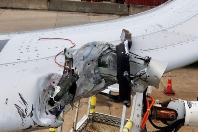 <p>The damaged wing of the American Airlines Airbus A321 aircraft</p>