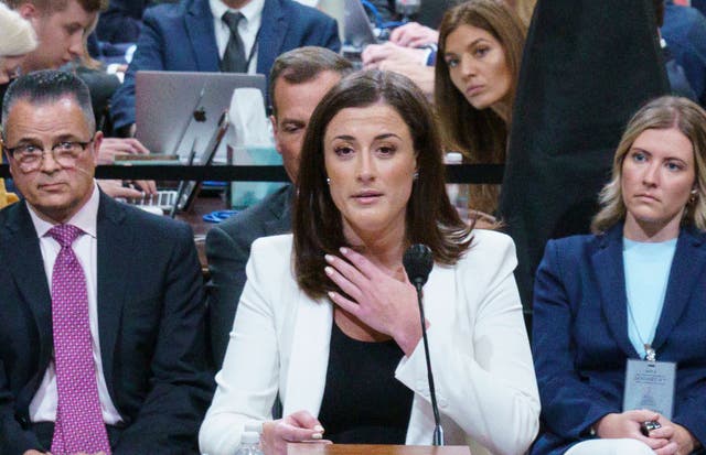 <p>Cassidy Hutchinson, an aide to then White House chief of staff Mark Meadows, describes the actions of former US president Donald Trump as she testifies during a House Select Committee hearing to Investigate the January 6th Attack on the US Capitol</p>