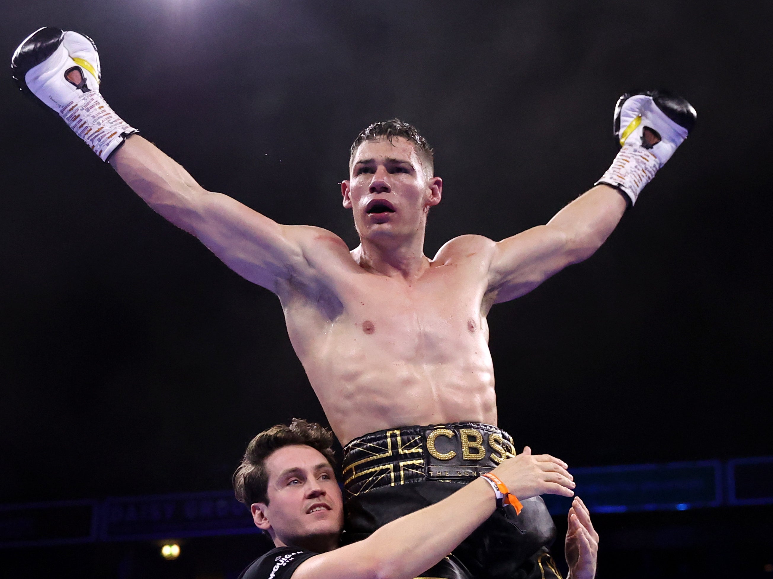Chris Billam-Smith celebrates his knockout of Tommy McCarthy with trainer Shane McGuigan