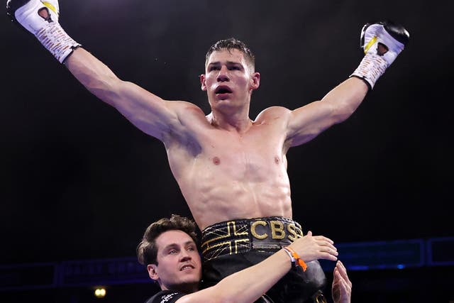 <p>Chris Billam-Smith celebrates his knockout of Tommy McCarthy with trainer Shane McGuigan</p>