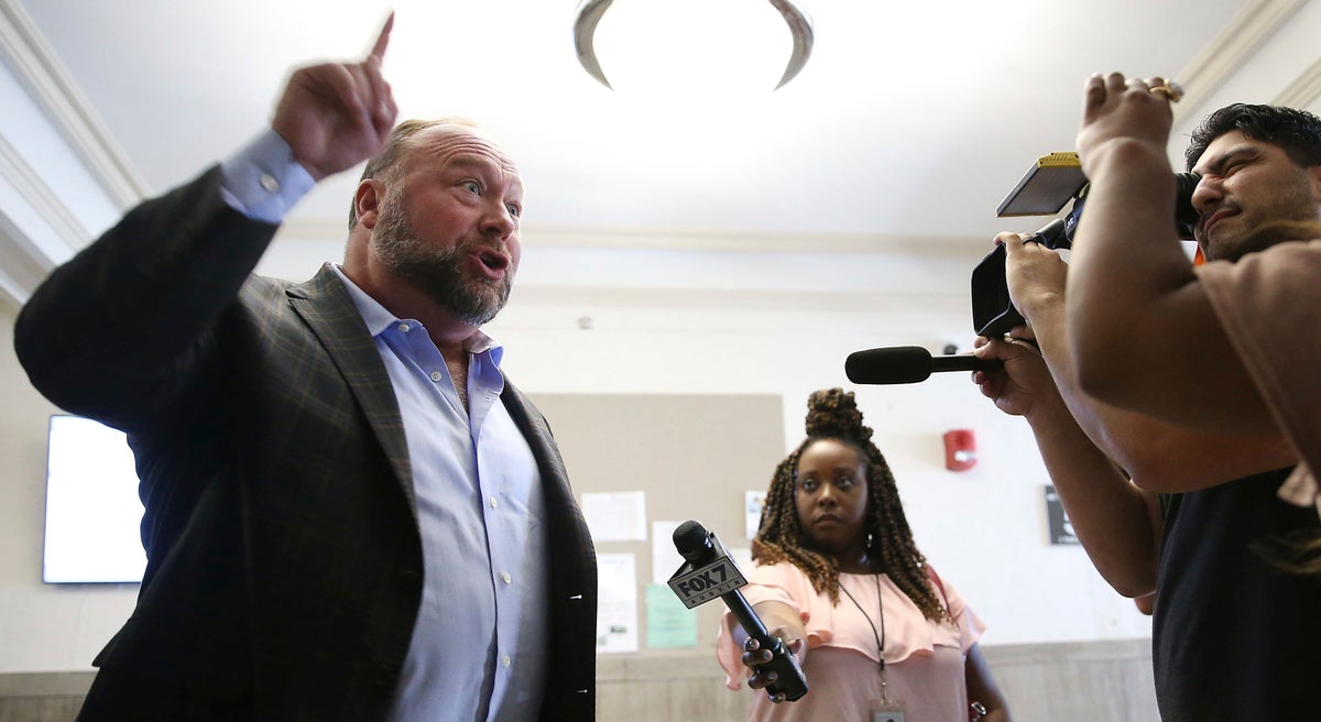 Alex Jones berates reporter as ‘pirate’ outside Sandy Hook trial