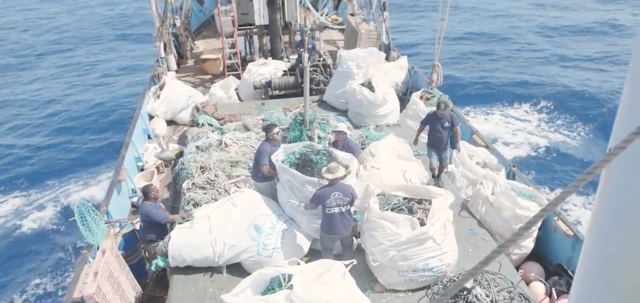 <p>The crew of a ship collecting garbage across the garbage patch between California and Hawaii</p>