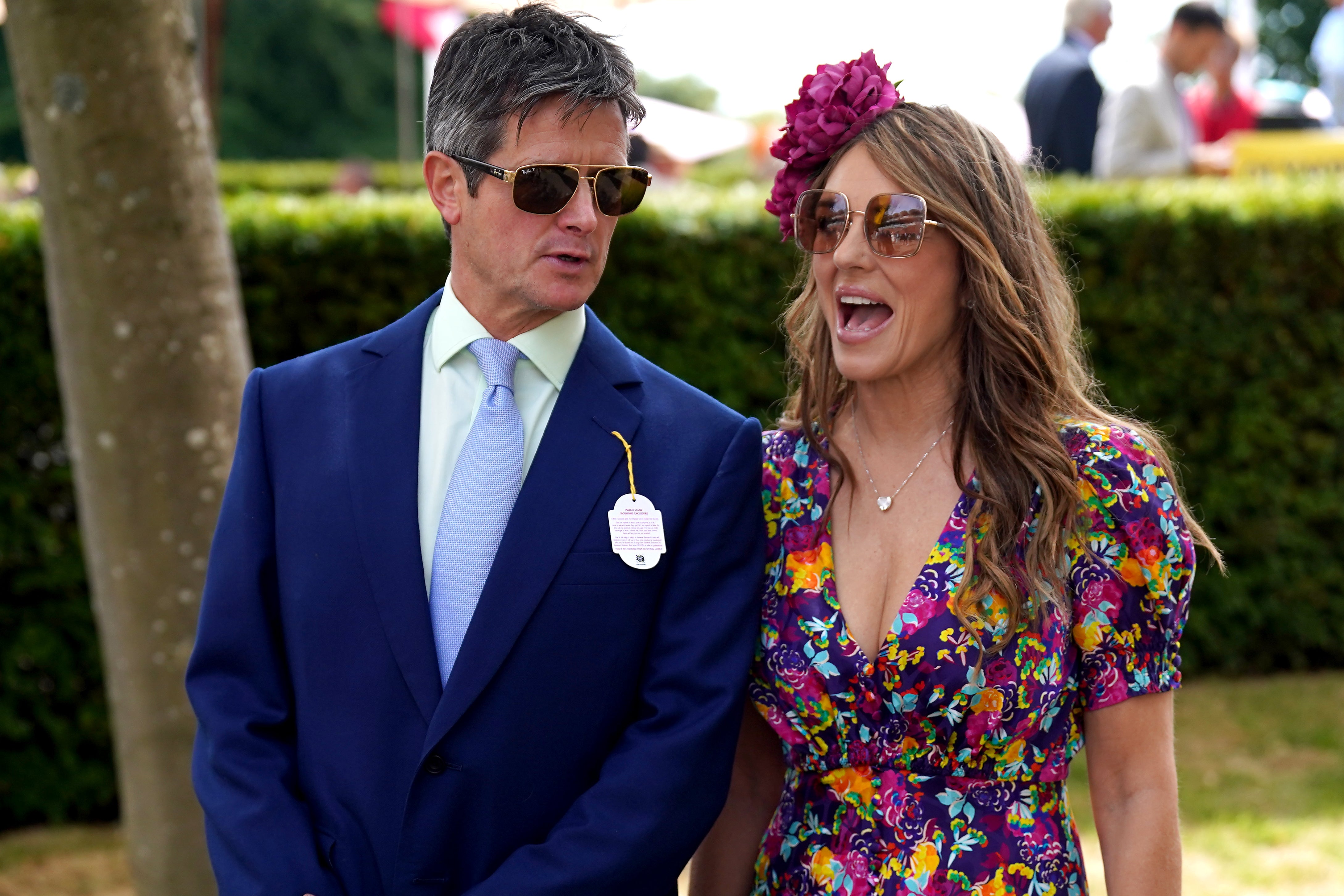 Liz Hurley was accompanied by Henry Birtles on day two of the Qatar Goodwood Festival 2022 (Adam Davy/PA)
