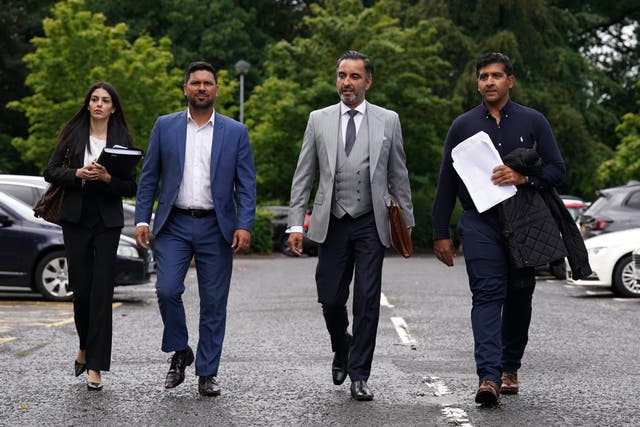 Qasim Sheikh, lawyer Aamer Anwar and Majid Haq arrive for a press conference at Stirling Court Hotel (Andrew Milligan/PA)