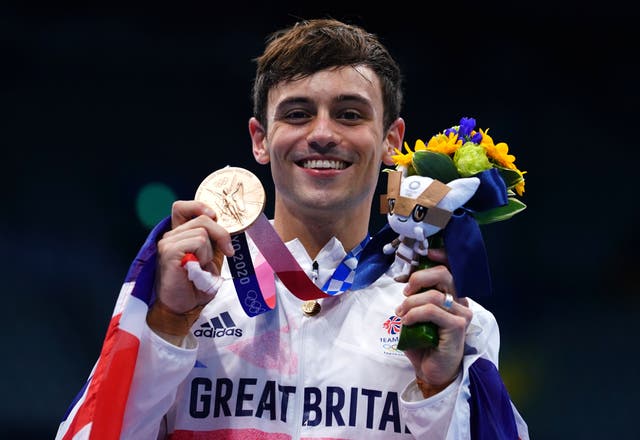 Daley is among the famous athletes carrying the baton (Adam Davy/PA)