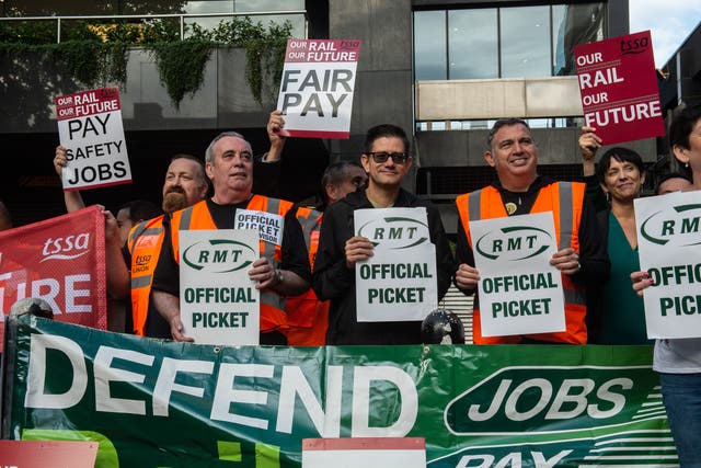 <p>Striking members of the RMT and TSSA trade unions joined the picket line at Euston station on Wednesday</p>
