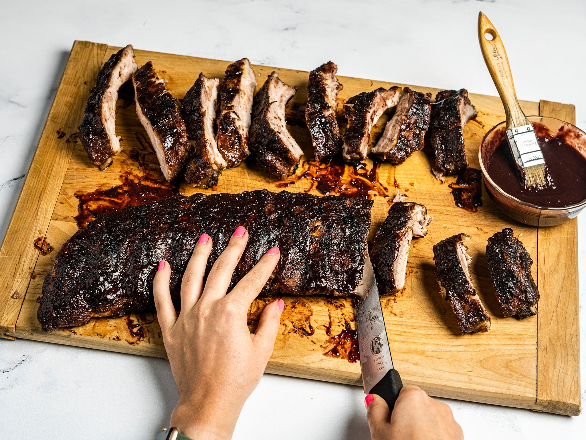 The tenderest and meatiest of all ribs are the baby back