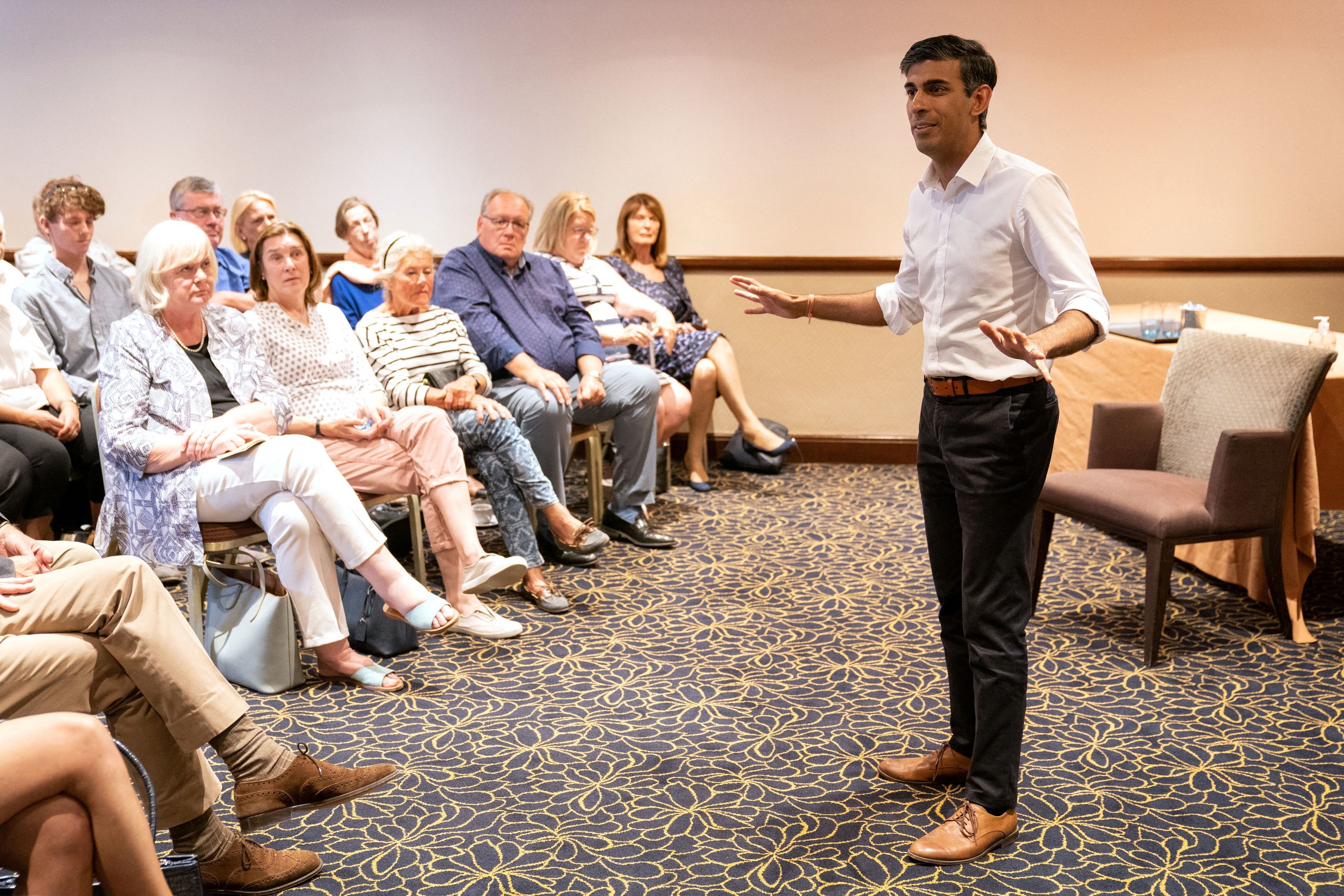 Rishi Sunak delivers a speech during a campaign event in Newmarket