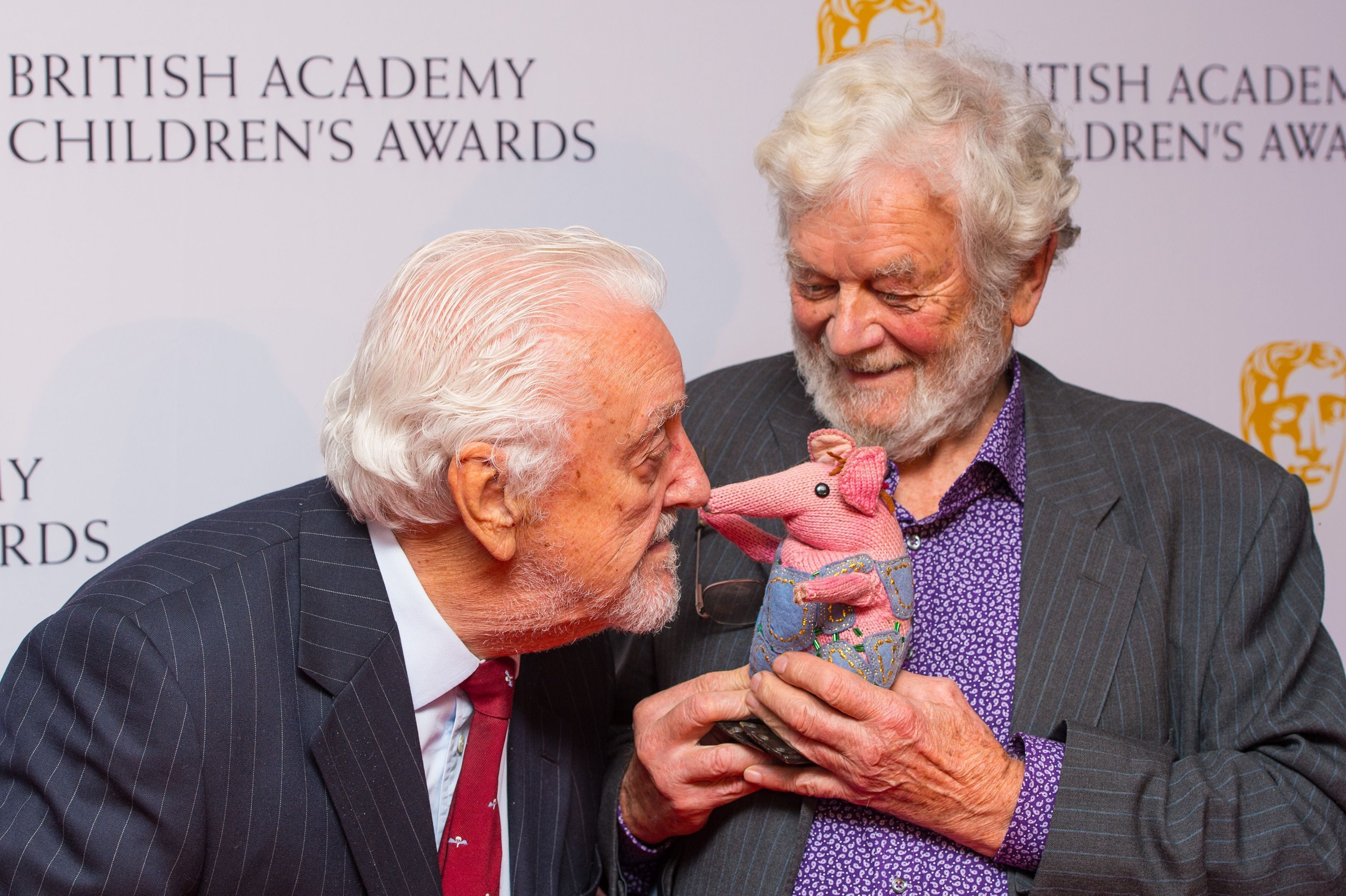 Cribbins was a stalwart of children’s television throughout his career, a friendly face and voice for generations of youngsters whether he was narrating The Wombles or telling stories in Old Jack’s Boat. Here he is with Clangers creator Peter Firmin, plus a friend (Dominic Lipinski/PA)