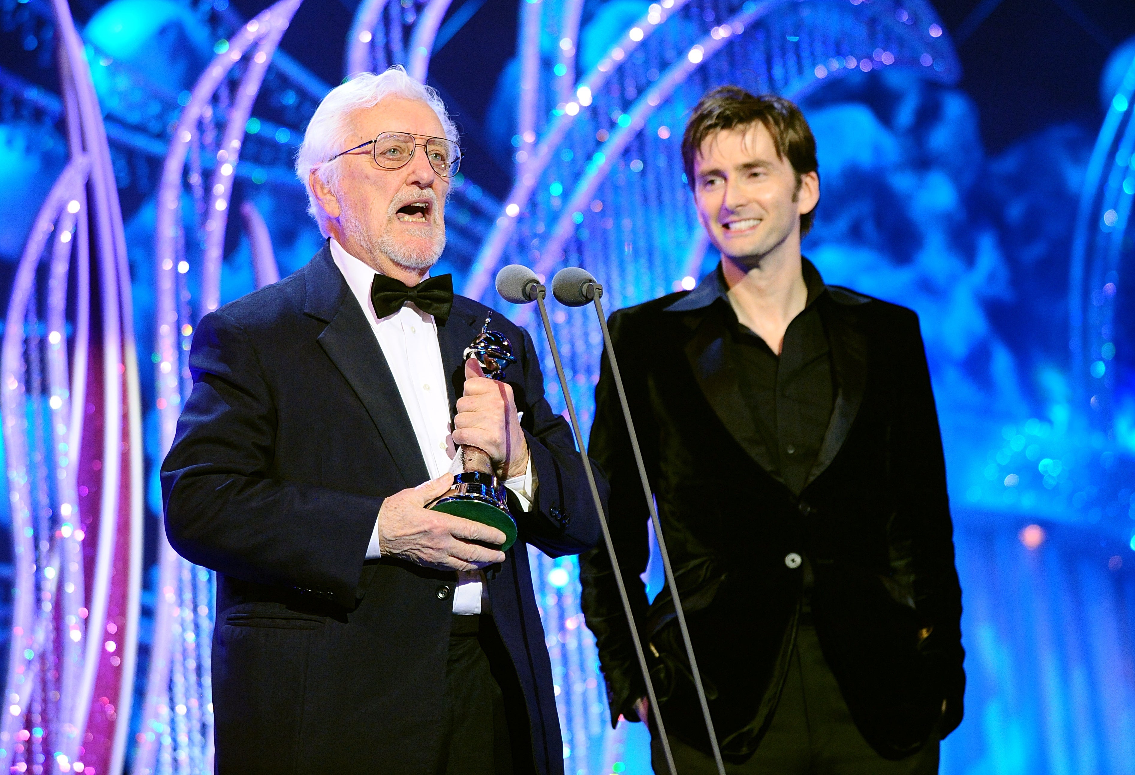 Cribbins endeared himself to a new generation of viewers with a recurring role in Doctor Who, alongside the 10th Doctor, David Tennant. Here he collects the award for Best Drama at the National Television Awards in 2010 (Ian West/PA)
