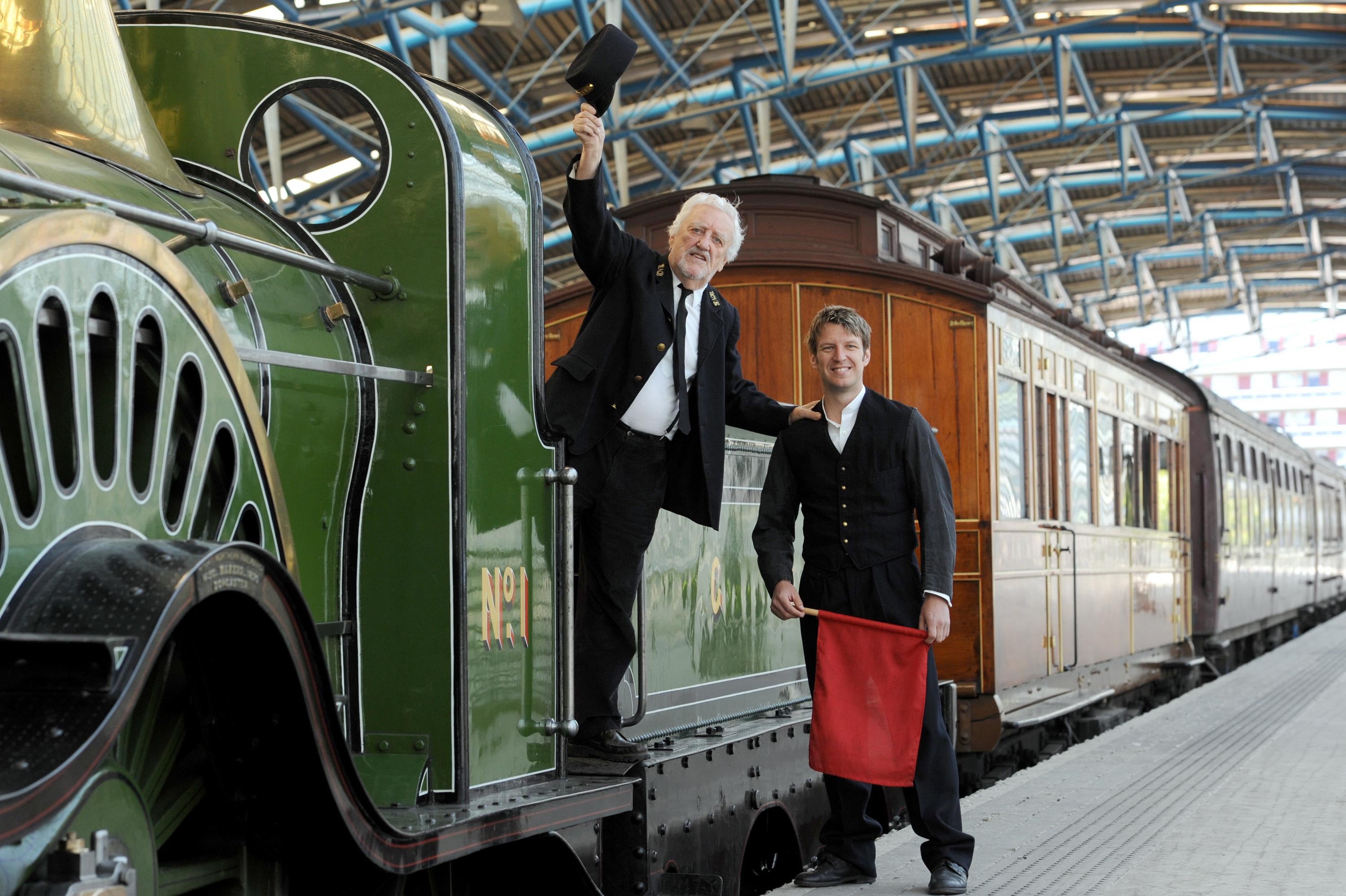 Many years later, Cribbins is greeted by Marshall Lancaster as he arrives at Waterloo Station, London onboard the 66-tonne Stirling Single, the train used in the original Railway Children film, to promote a theatre production of the story (Anthony Devlin/PA)